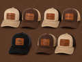 Seven custom leather patch trucker hats in tan, brown and black, engraved with the Prysmian Channell, LSRP, Milacron and 4-Star Hose & Supply logos